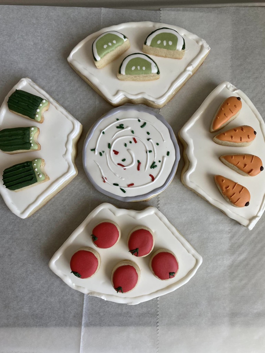 Veggie tray themed decorated sugar cookies with carrot and radish designs