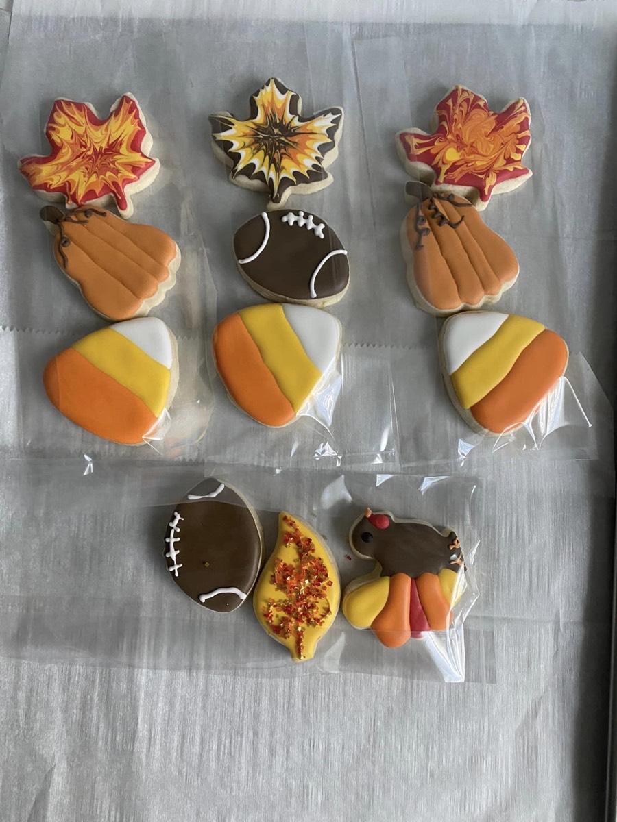 Fall themed decorated sugar cookies for autumn celebrations